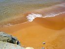 The red sandy beach of Xi