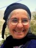 Vriendelijke vrouw in Olympos